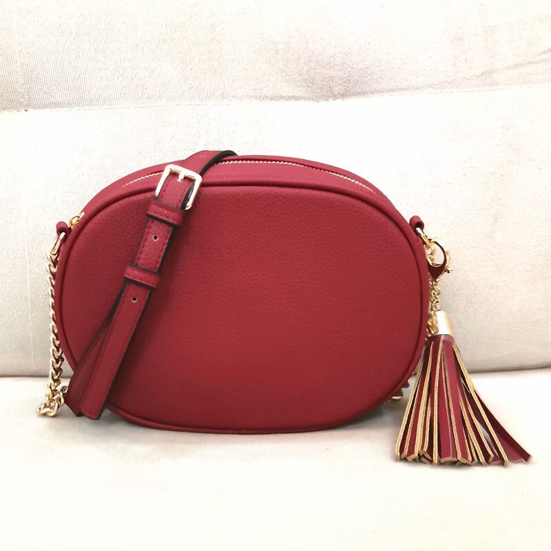 oval cross body women bags top quality lychee pattern pu leather tassel bag red